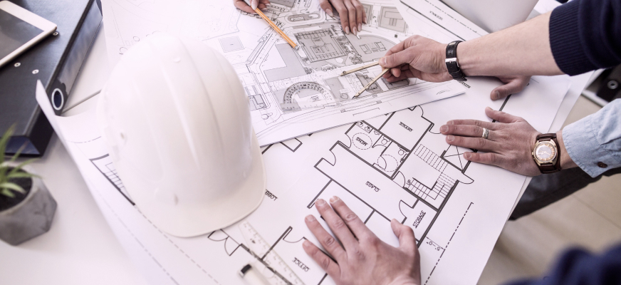 The architect designs the building project