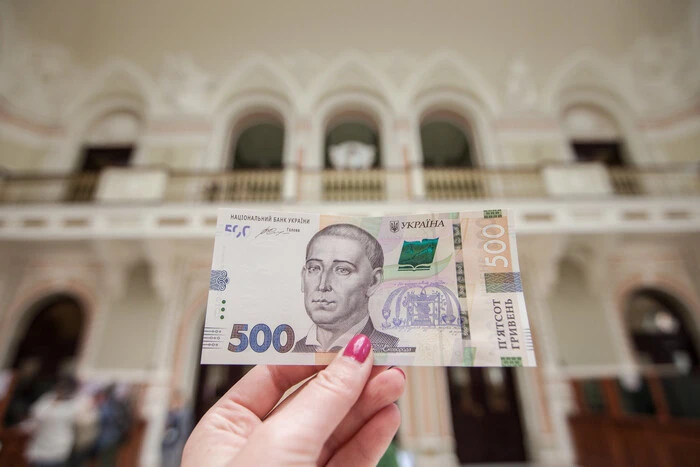 woman in a room with money