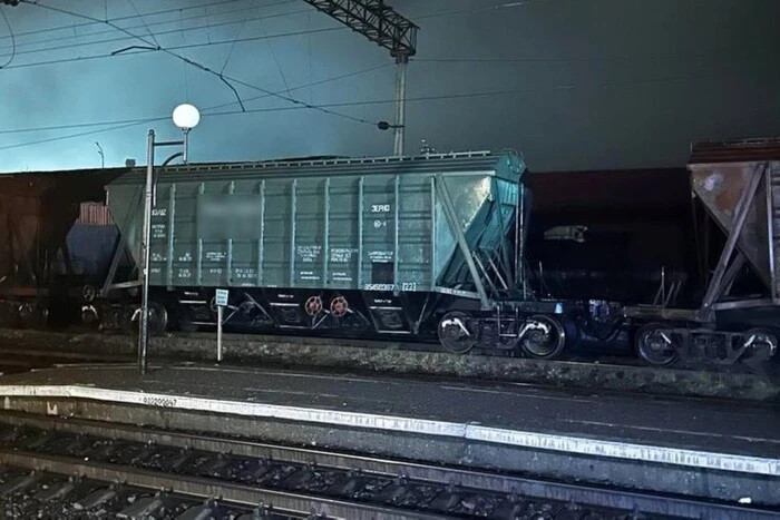 Teenager on the roof of an electric train