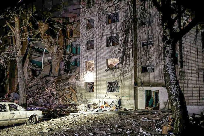 The bodies of a mother and child in the rubble