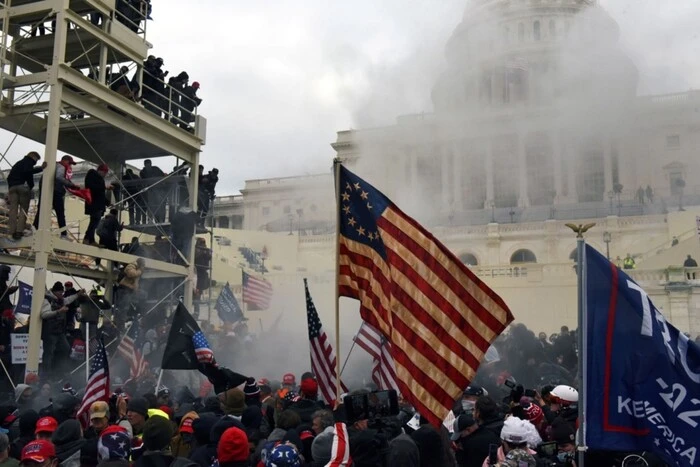 Arrested man with a torch near the Capitol