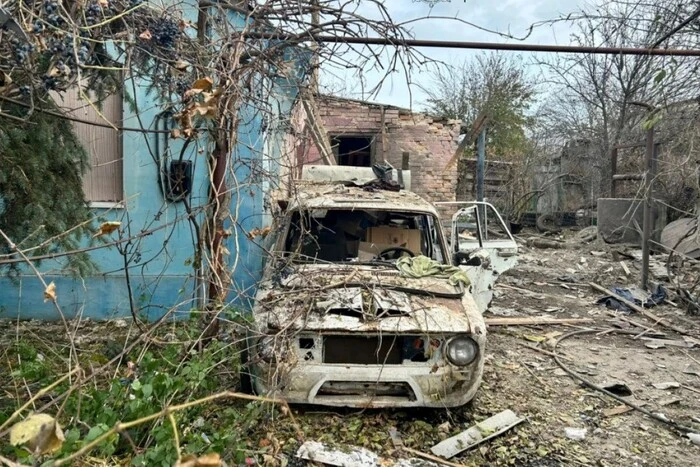 Residents of Zaporizhzhia examine damaged buildings