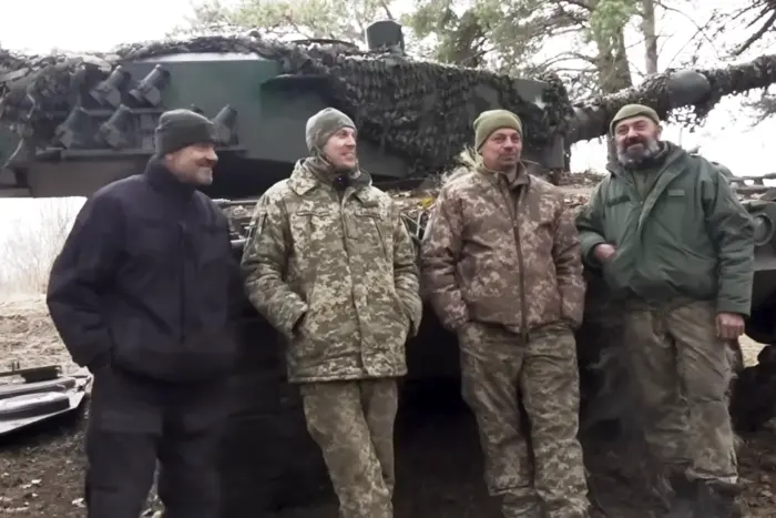 Music teacher, gardener, and builder on the Leopard tank