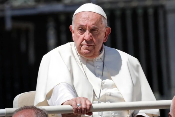 Pope Francis with a frowning expression