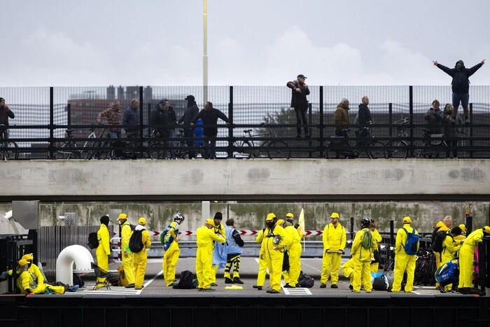 Activists attempt to stop a cruise ship