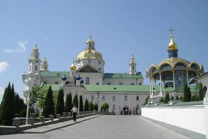 Boards of Pochayiv Lavra against the backdrop of the council building