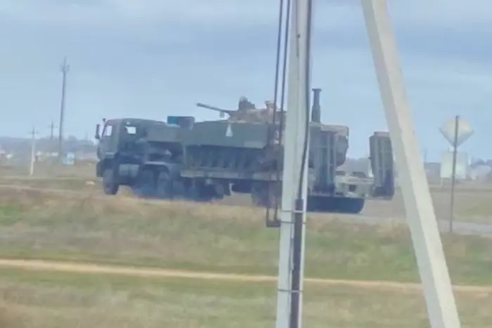 Column of military equipment on the road