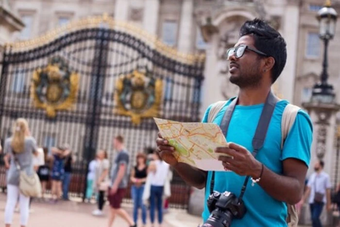 Tourists from India against the backdrop of landmarks