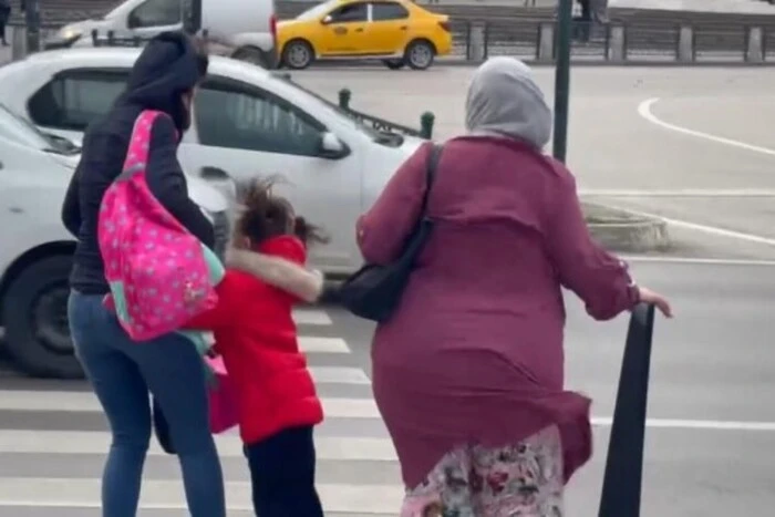 Children being blown by the wind in Turkey