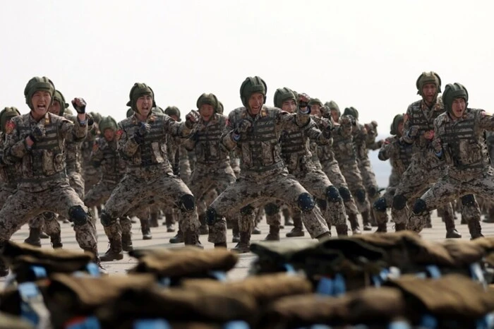 North Korean soldiers against a backdrop of missiles