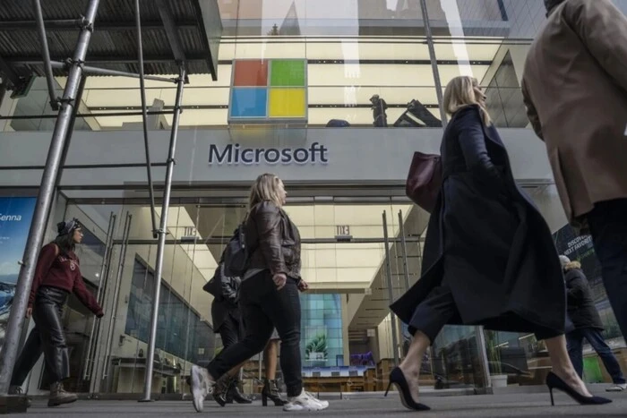 Microsoft logo against the backdrop of American traffic