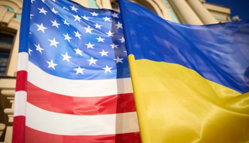 Flags of Ukraine and the USA on a green background