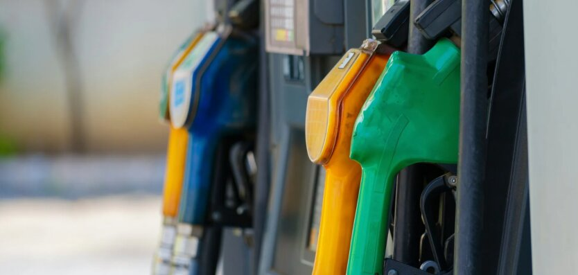 Red lantern at a fuel station with gasoline prices