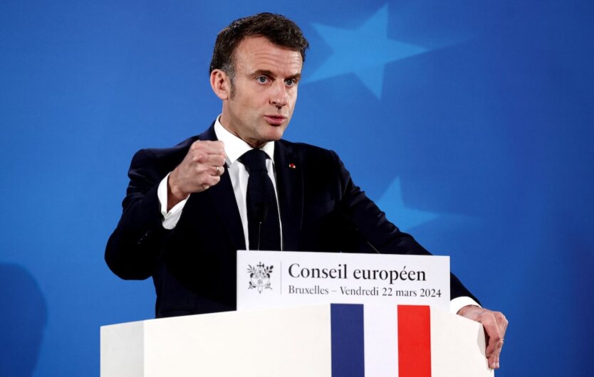 Portrait of Emmanuel Macron on a blue background