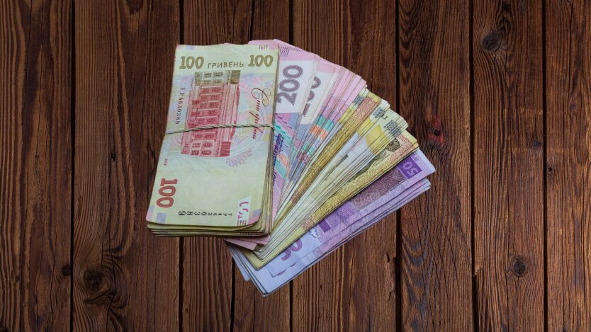A Ukrainian pensioner contemplates the ability to reclaim her pension
